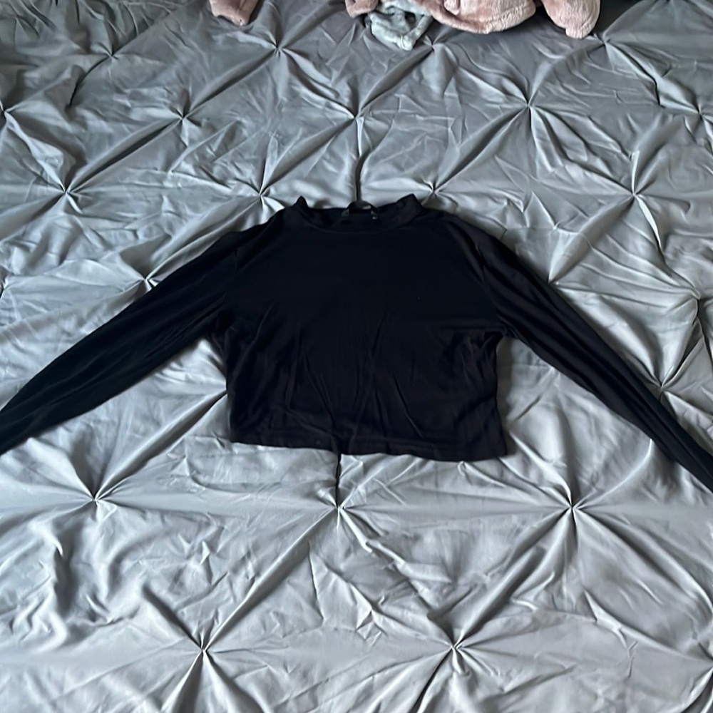 size extra small black long sleeve shirt, in very good condition.